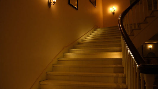 Well-lit staircase with ambient lighting.